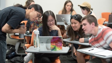 Assistant Professor Justin Li teaches a computer science class in Mosher 3 in September 2017