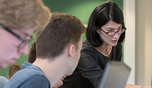 Professor Kathryn Leonard works with computer science students
