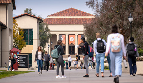 Students on the walkway in front of Thorne Hall