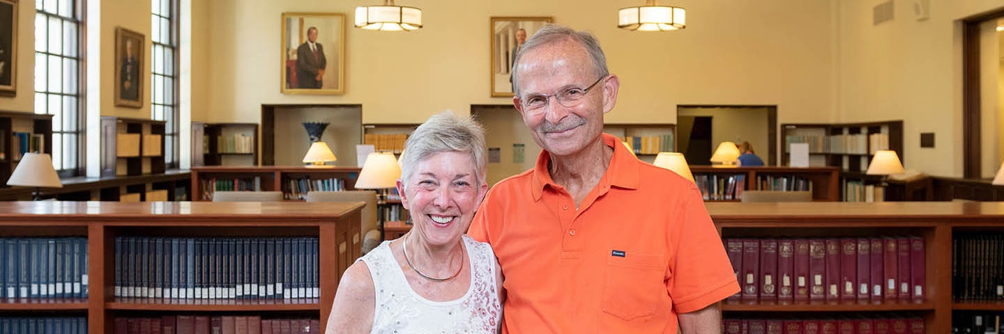 The Gibbys pose in Oxy's library