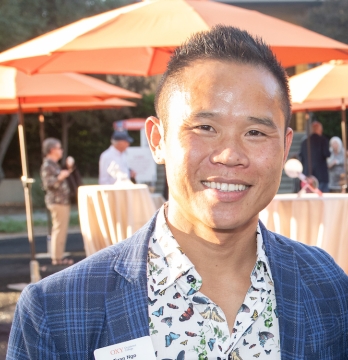 Tuan Ngo smiling at the camera