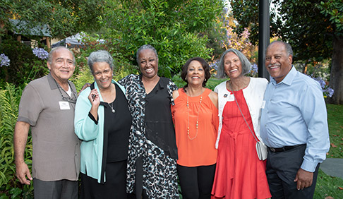 A group of Oxy volunteers smile for the camera